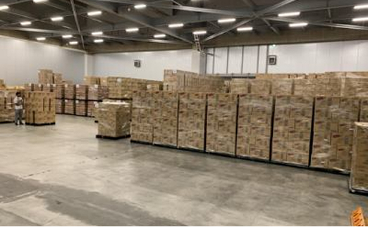 Cardboard boxes stacked in a warehouse