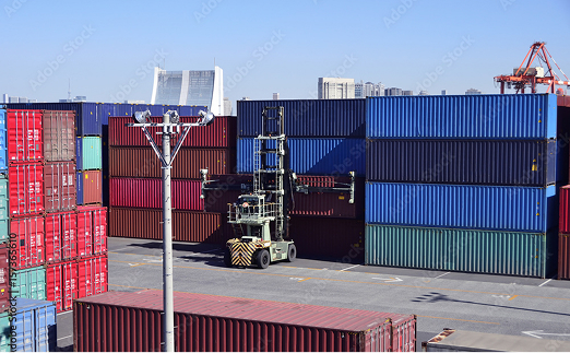 Shipping containers stacked at a port